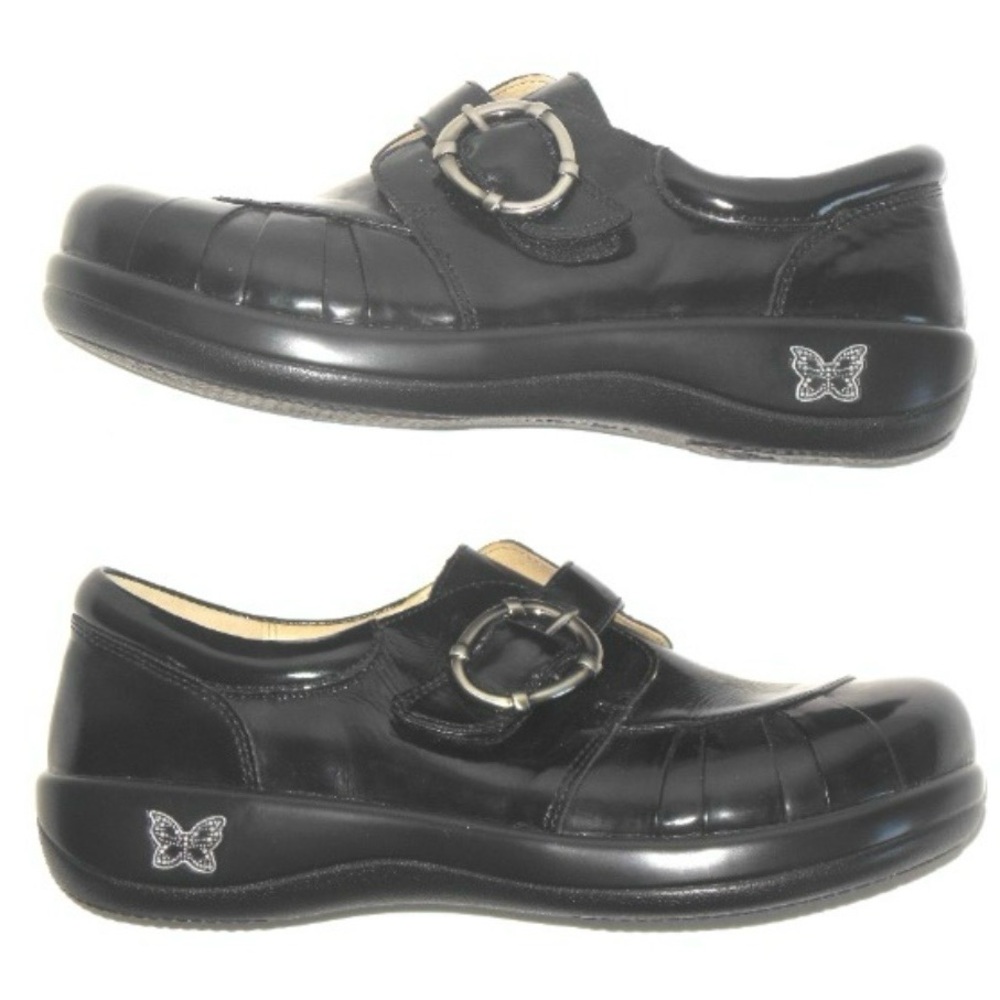 Sleek Black Dress Shoes with Butterfly Detail